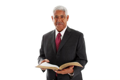 pastor holding a bible